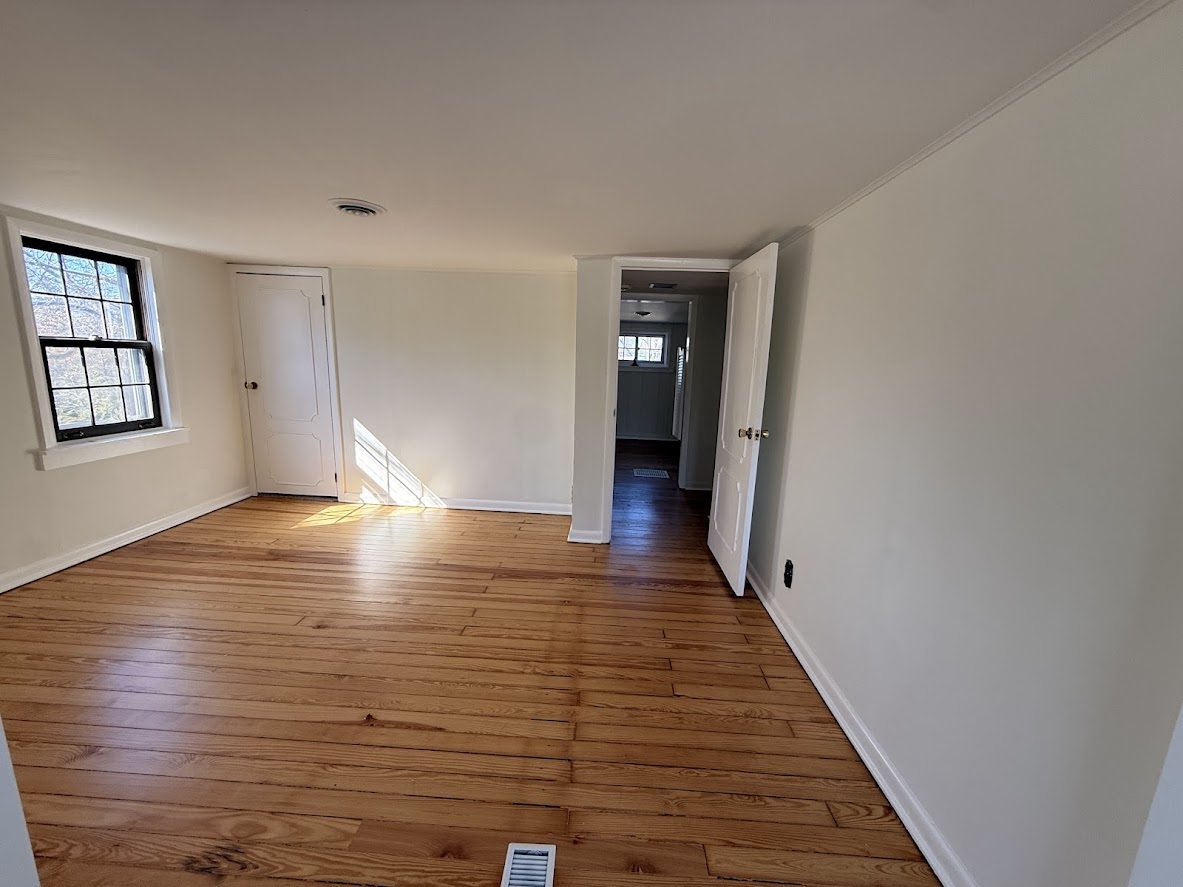 18404 Dixie Highway Homewood, IL 60430 - Photo 14 of 20 a view of a room with wooden floor and staircase