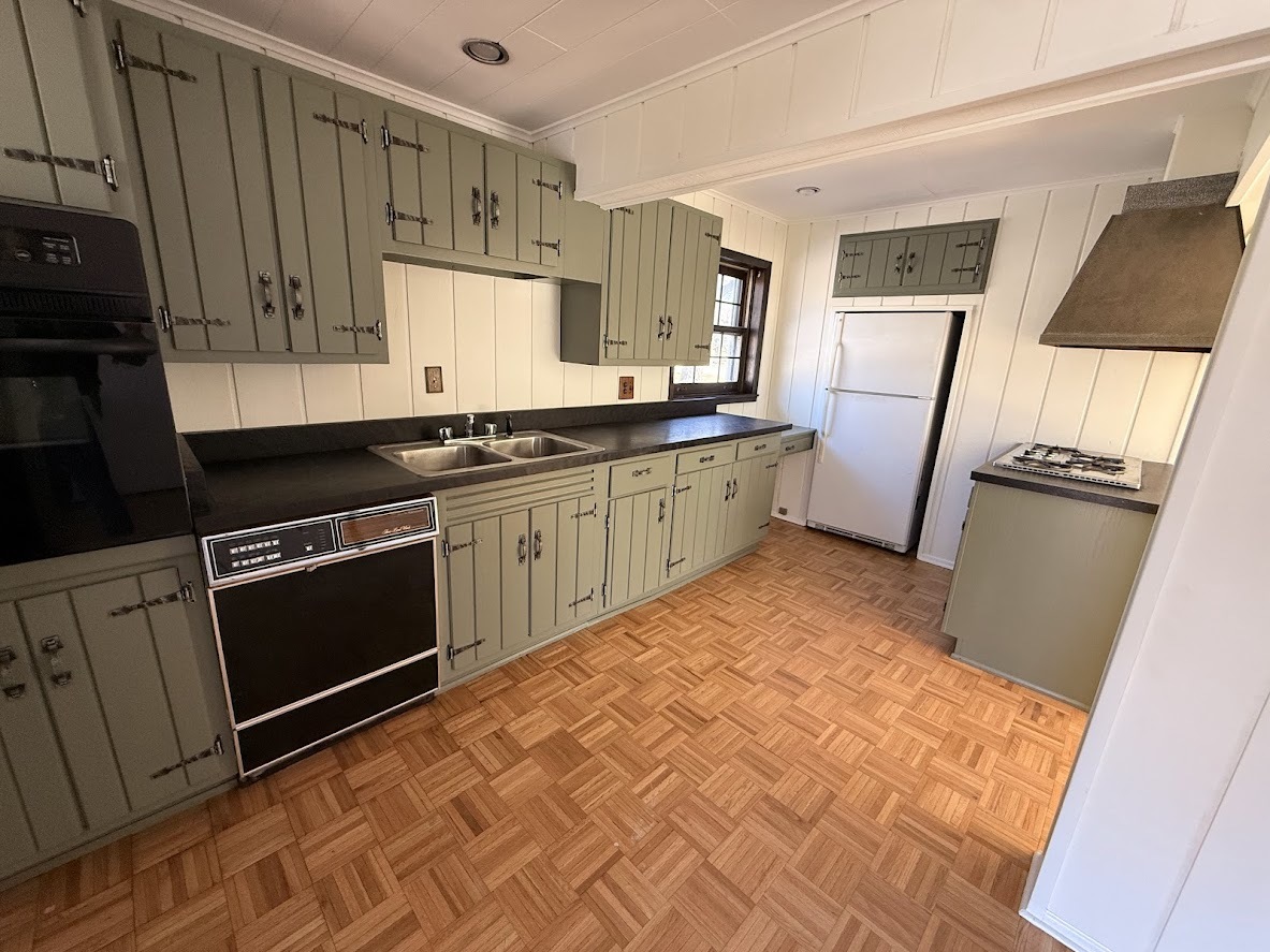 18404 Dixie Highway Homewood, IL 60430 - Photo 5 of 20 a kitchen with granite countertop a sink stove and refrigerator