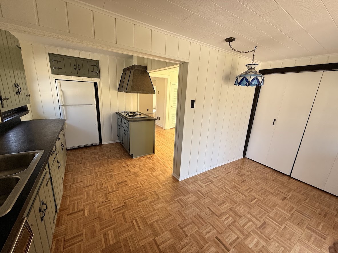 18404 Dixie Highway Homewood, IL 60430 - Photo 7 of 20 a kitchen with stainless steel appliances a refrigerator and cabinets