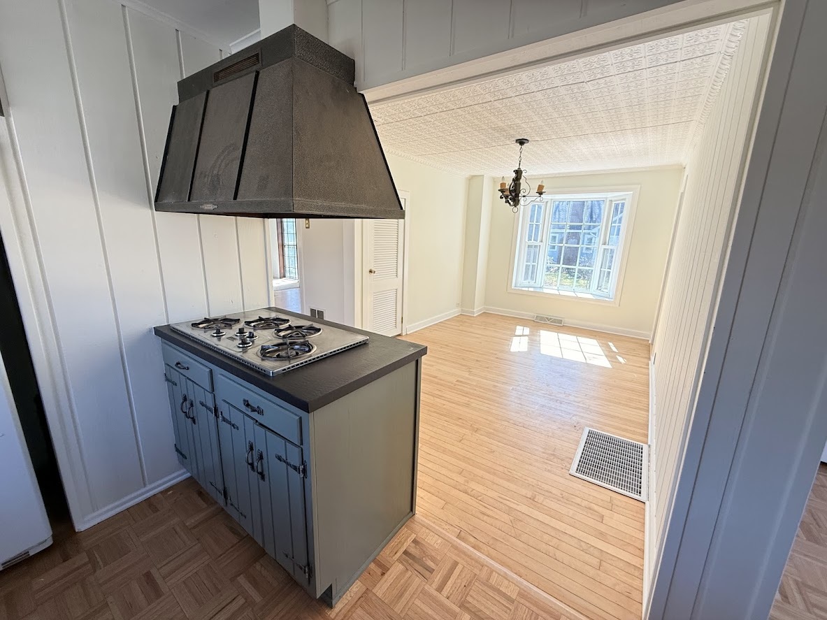 18404 Dixie Highway Homewood, IL 60430 - Photo 8 of 20 a kitchen with granite countertop a stove and a sink