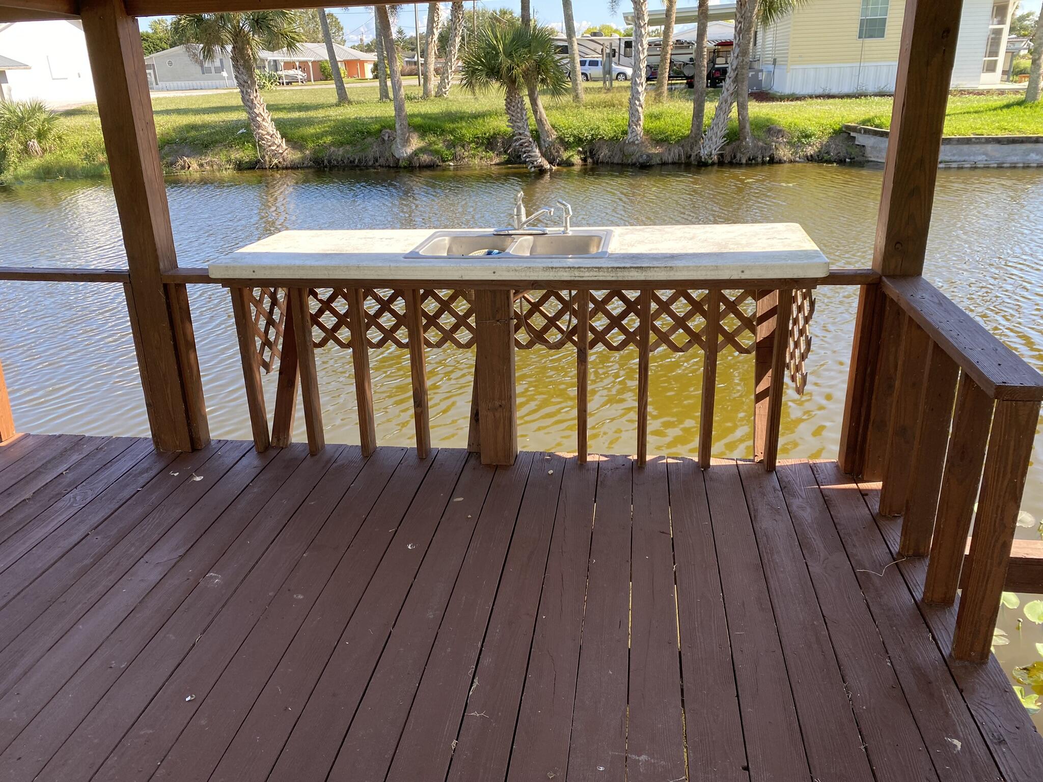 1101 25th Street Okeechobee, FL 34974 - Photo 24 of 28 a view of wooden floor with a lake view