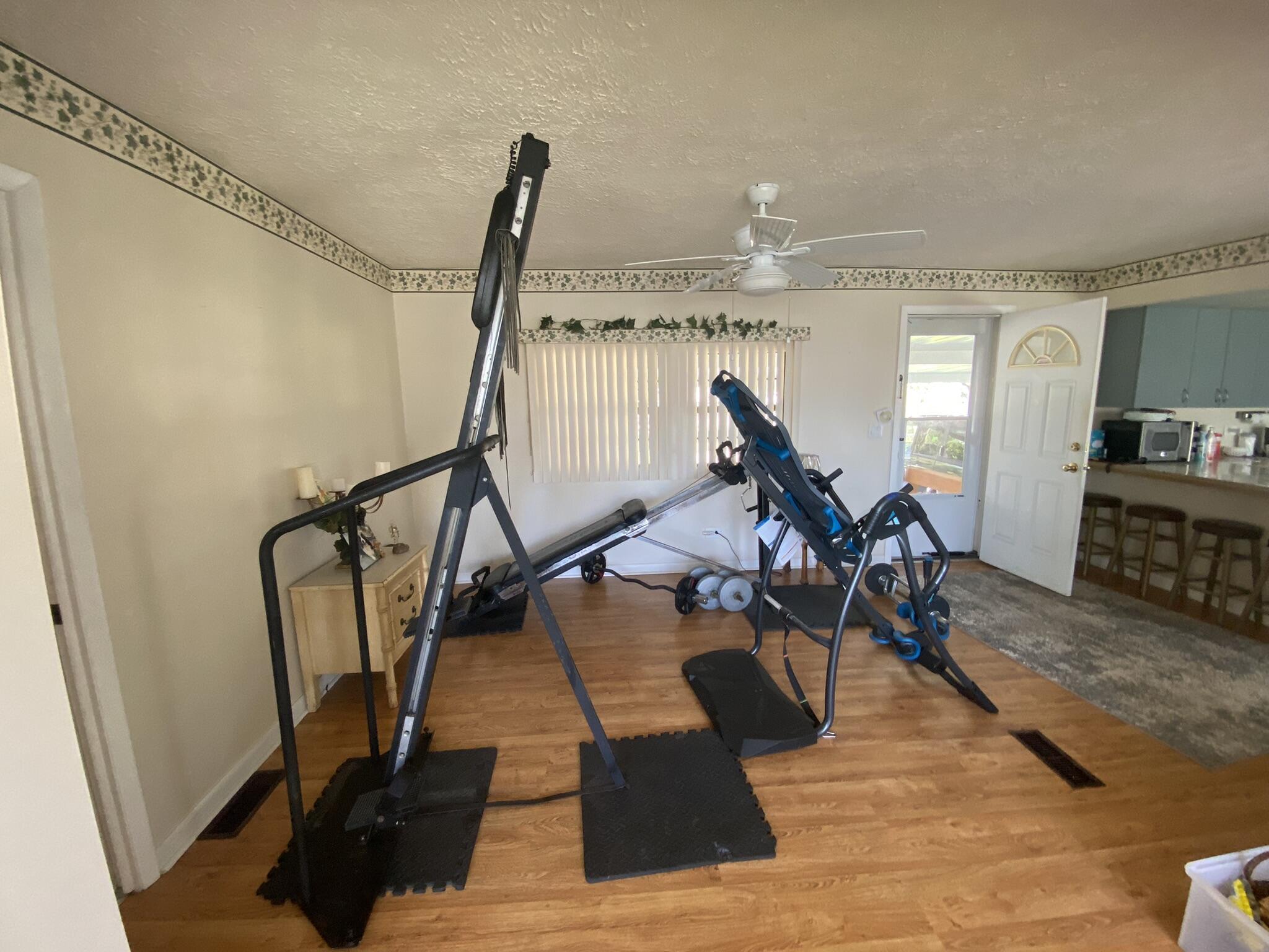 1101 25th Street Okeechobee, FL 34974 - Photo 6 of 28 a view of a room with gym equipment