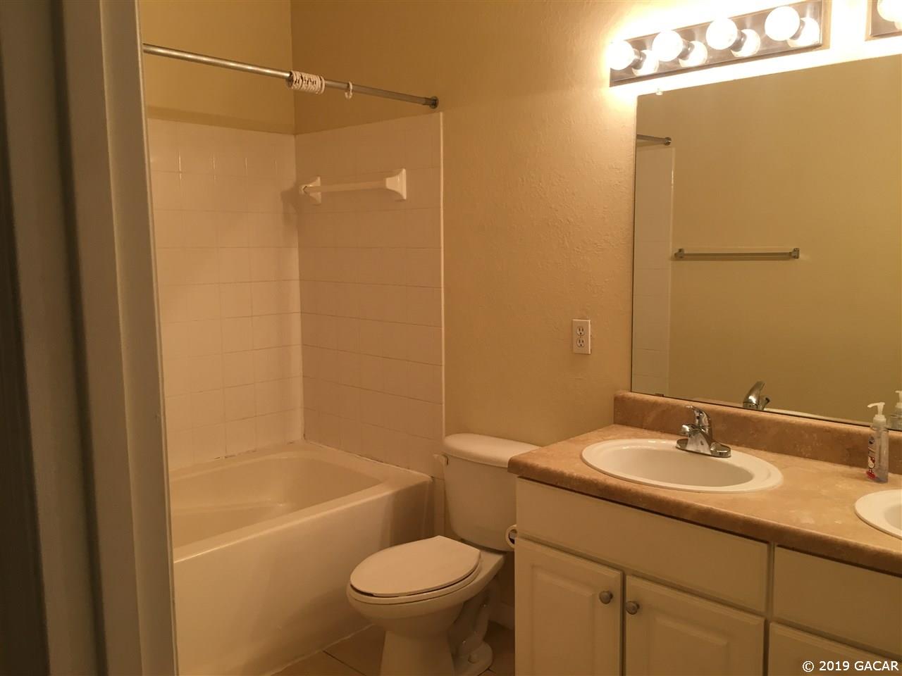 5065 Northwest 45th Road, Unit 106 Gainesville, FL 32606 - Photo 9 of 17 Roomy Double sink master bath