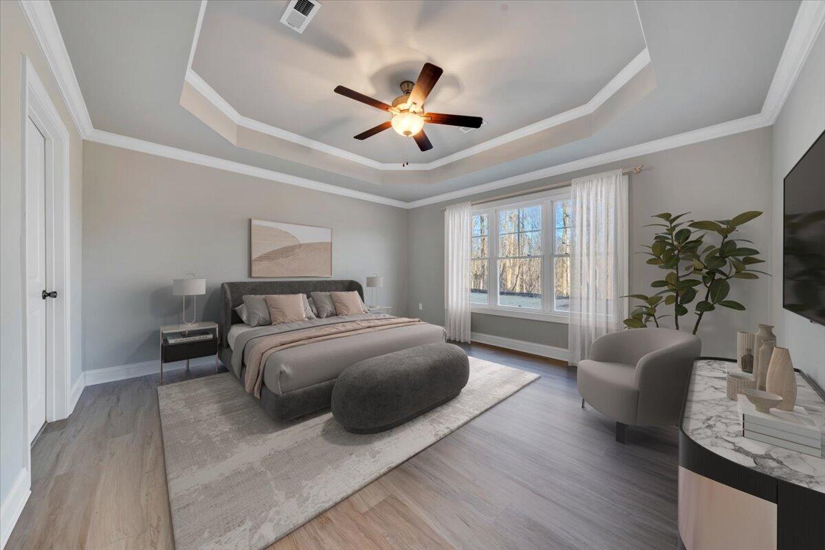 7168 Pkwy Vw Trail Roanoke, VA 24018 - Photo 12 of 26 a spacious bedroom with a bed and a couch