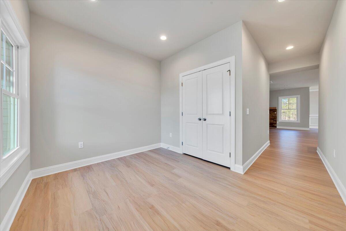 7168 Pkwy Vw Trail Roanoke, VA 24018 - Photo 2 of 26 wooden floor in an empty room with a window