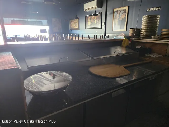 a kitchen with a sink and a stove