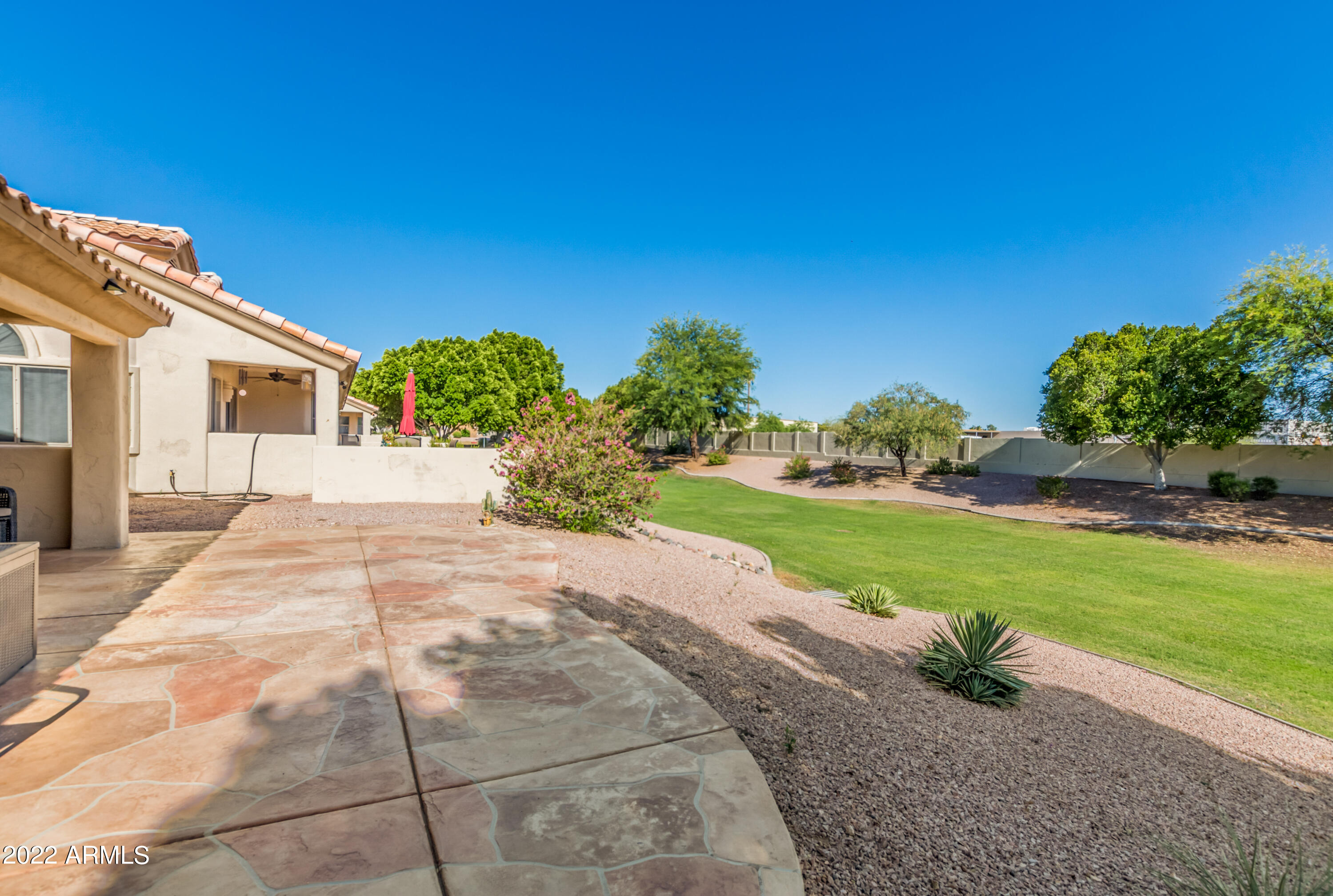 5830 East McKellips Road, Unit 76 Mesa, AZ 85215 - Photo 1 of 33 a view of a house with a yard