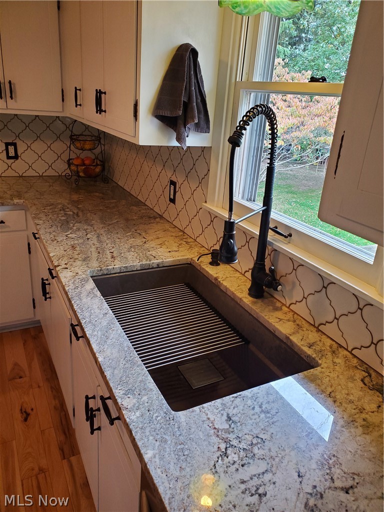 10141 Cutts Road Chardon, OH 44024 - Photo 8 of 24 Quartz sink with built in ledge system for food prep or drying