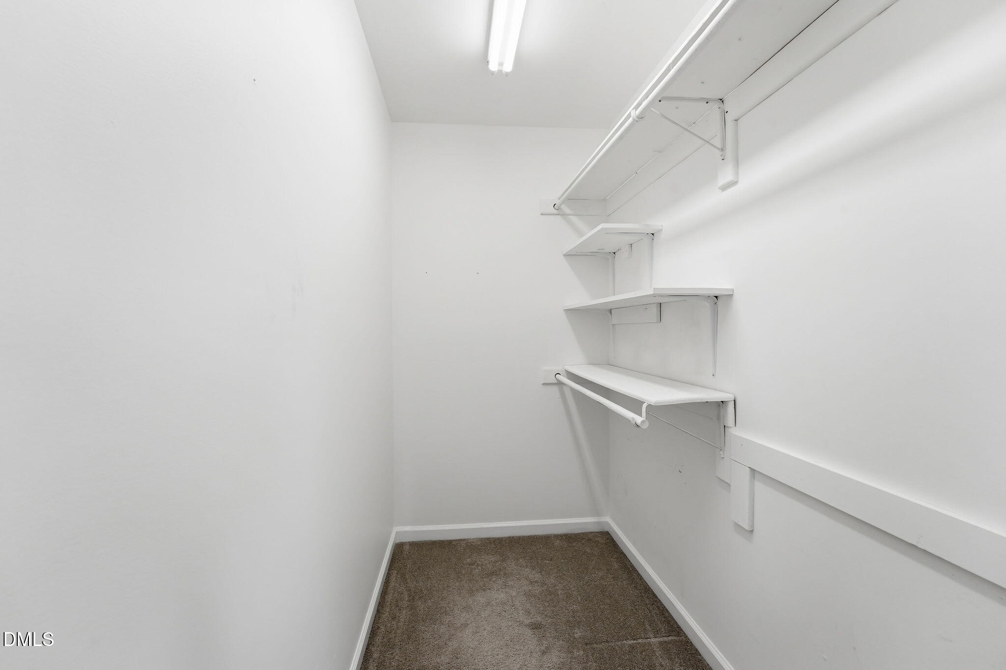 2201 Roswell Road Raleigh, NC 27615 - Photo 17 of 32 a view of an empty walk in closet