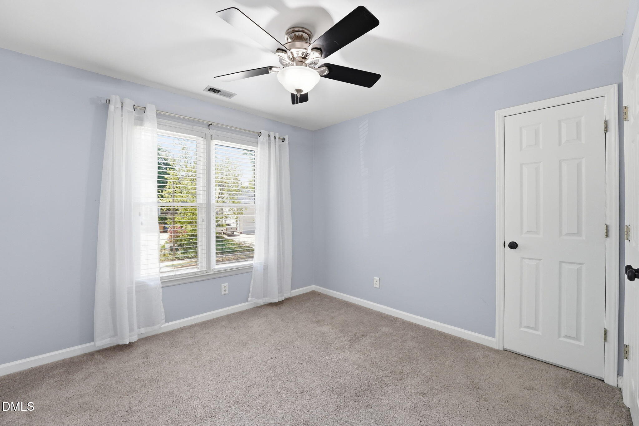 2201 Roswell Road Raleigh, NC 27615 - Photo 21 of 32 a view of an empty room with a window
