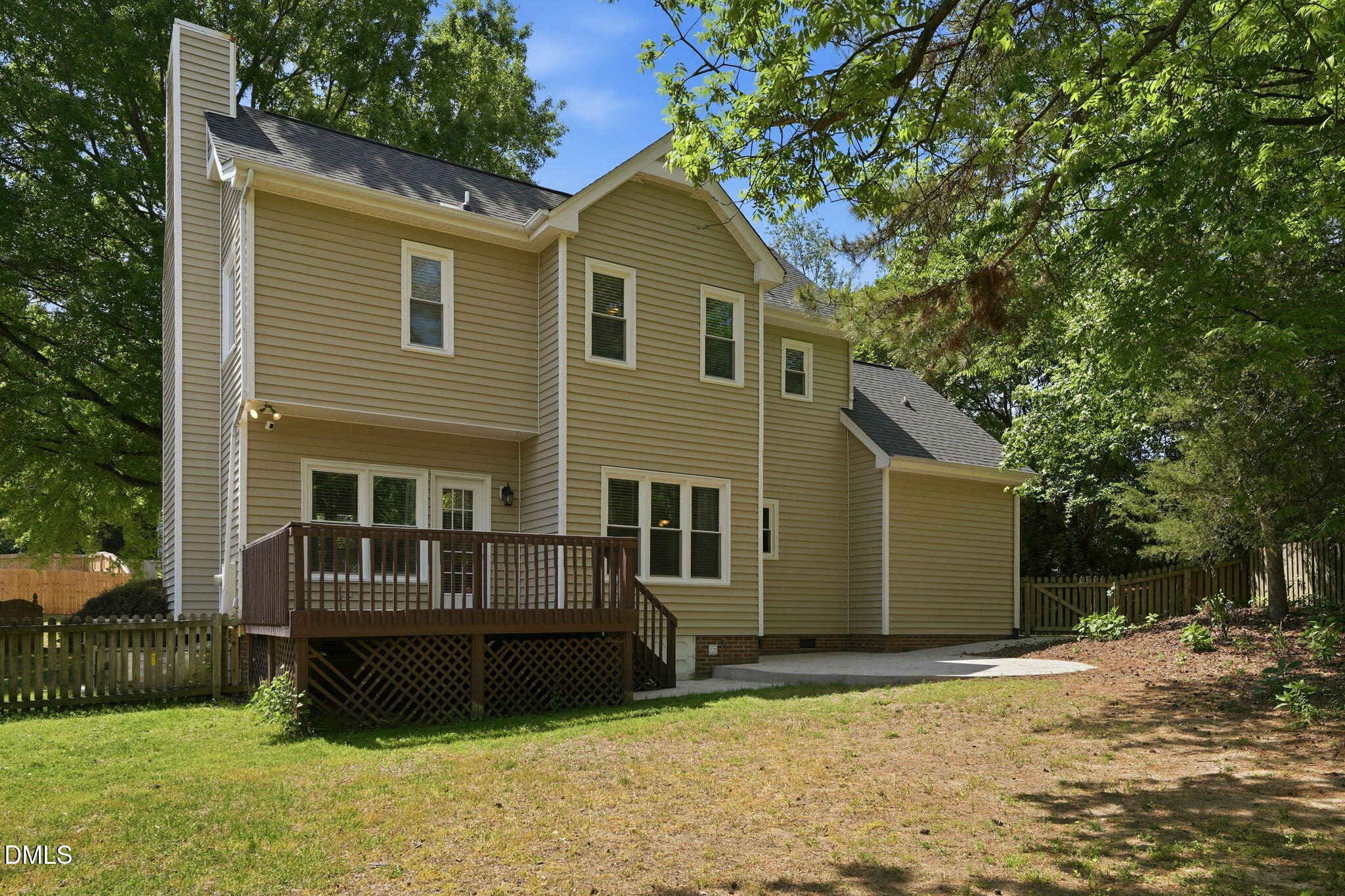 2201 Roswell Road Raleigh, NC 27615 - Photo 24 of 32 a front view of a house with a garden