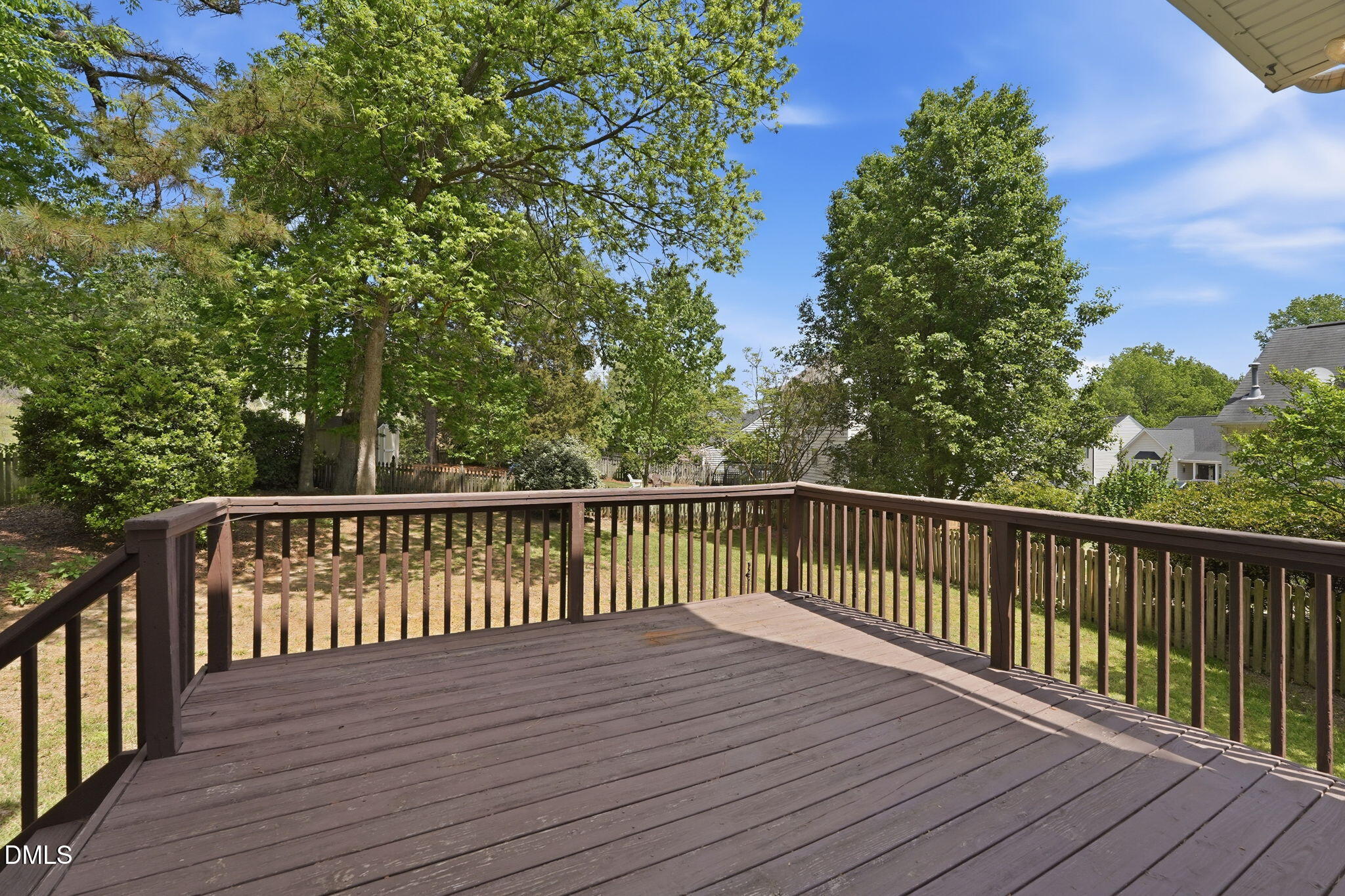 2201 Roswell Road Raleigh, NC 27615 - Photo 25 of 32 a view of balcony with wooden floor and fence