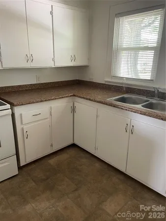 a view white cabinets and window