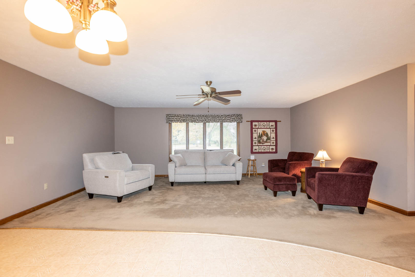 19051 Meander Way Bloomington, IL 61705 - Photo 11 of 30 a living room with furniture and a large window