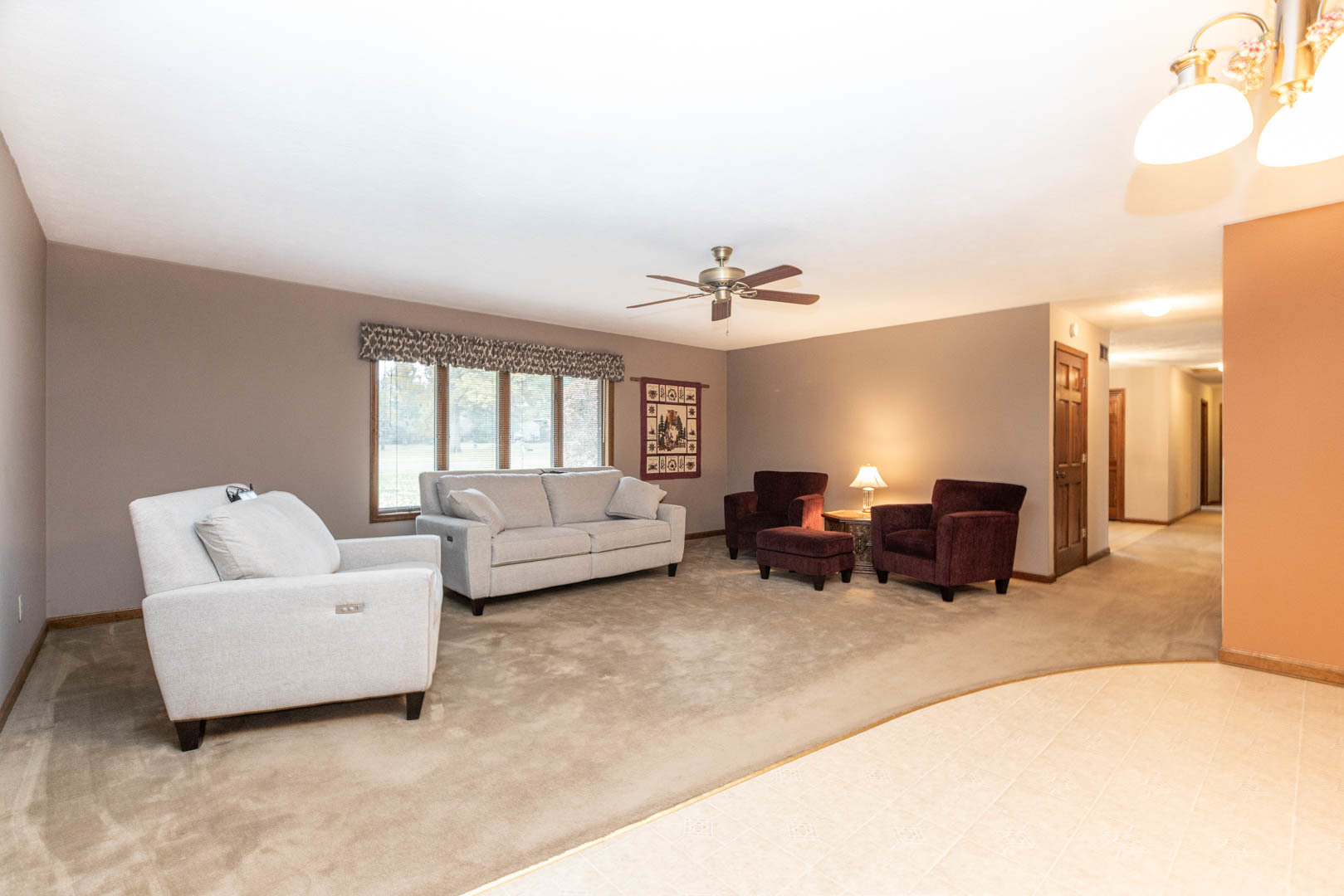 19051 Meander Way Bloomington, IL 61705 - Photo 12 of 30 a living room with furniture and white walls