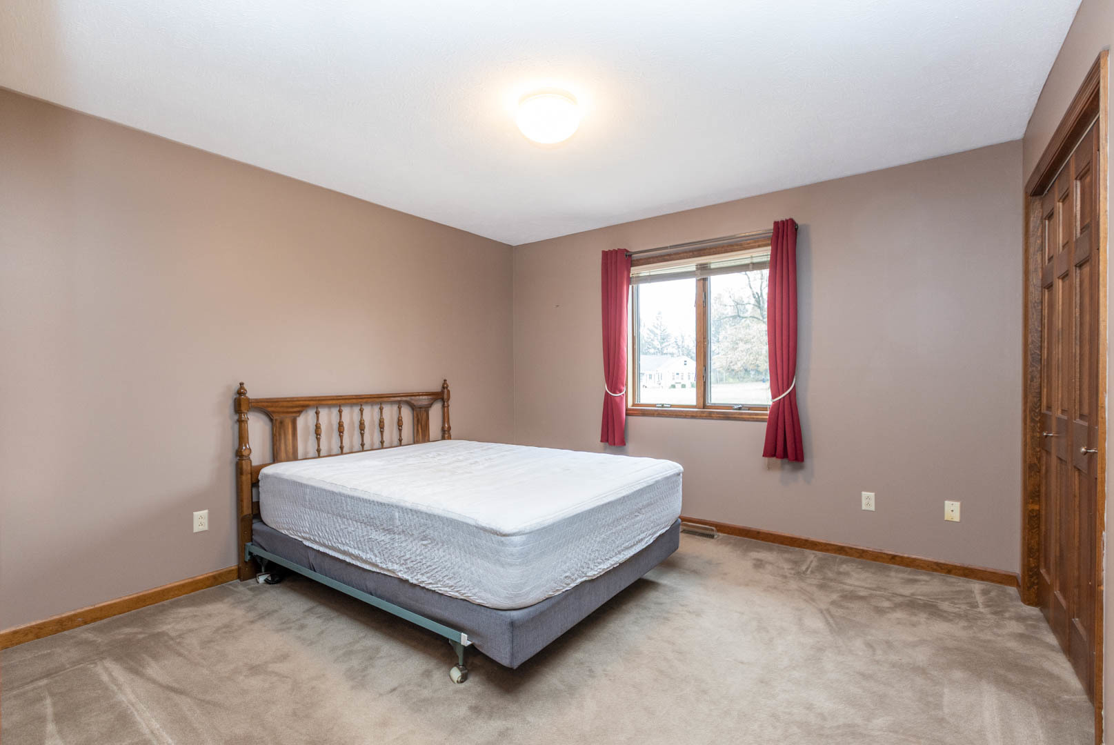 19051 Meander Way Bloomington, IL 61705 - Photo 18 of 30 a bed sitting in a spacious bedroom next to a window