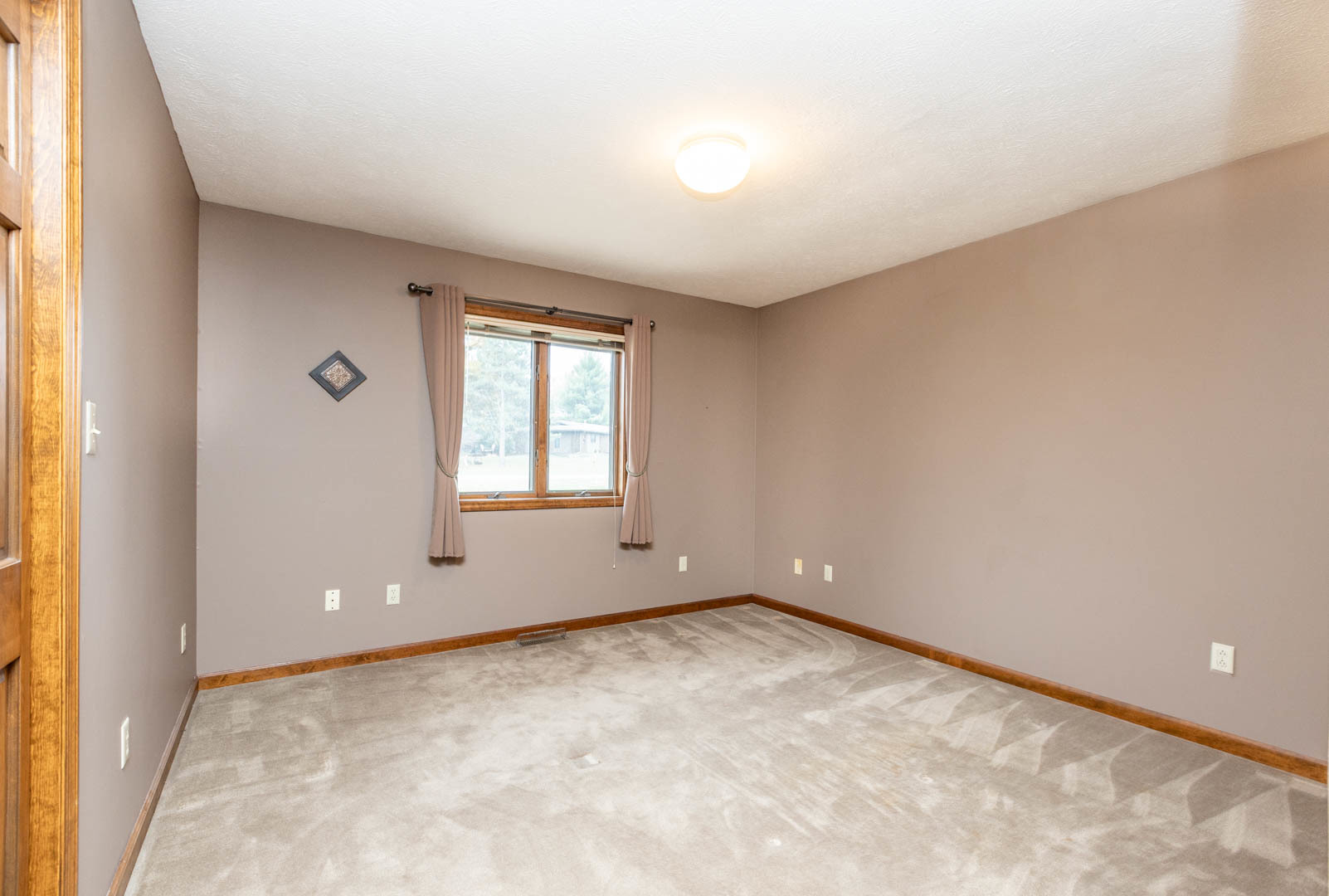 19051 Meander Way Bloomington, IL 61705 - Photo 19 of 30 an empty room with windows