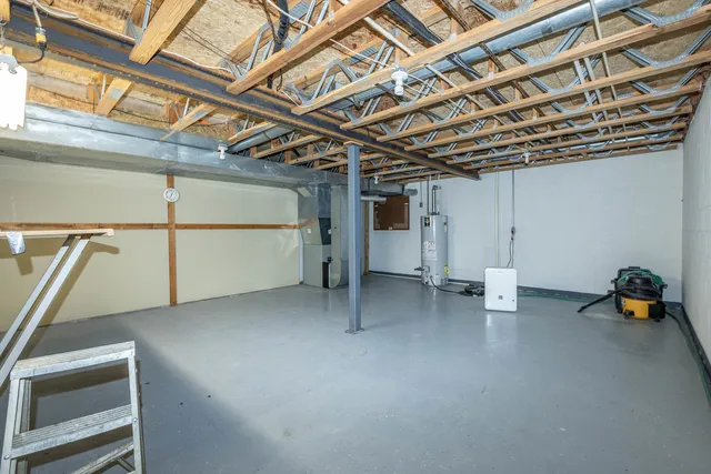 a view of a room with wooden walls