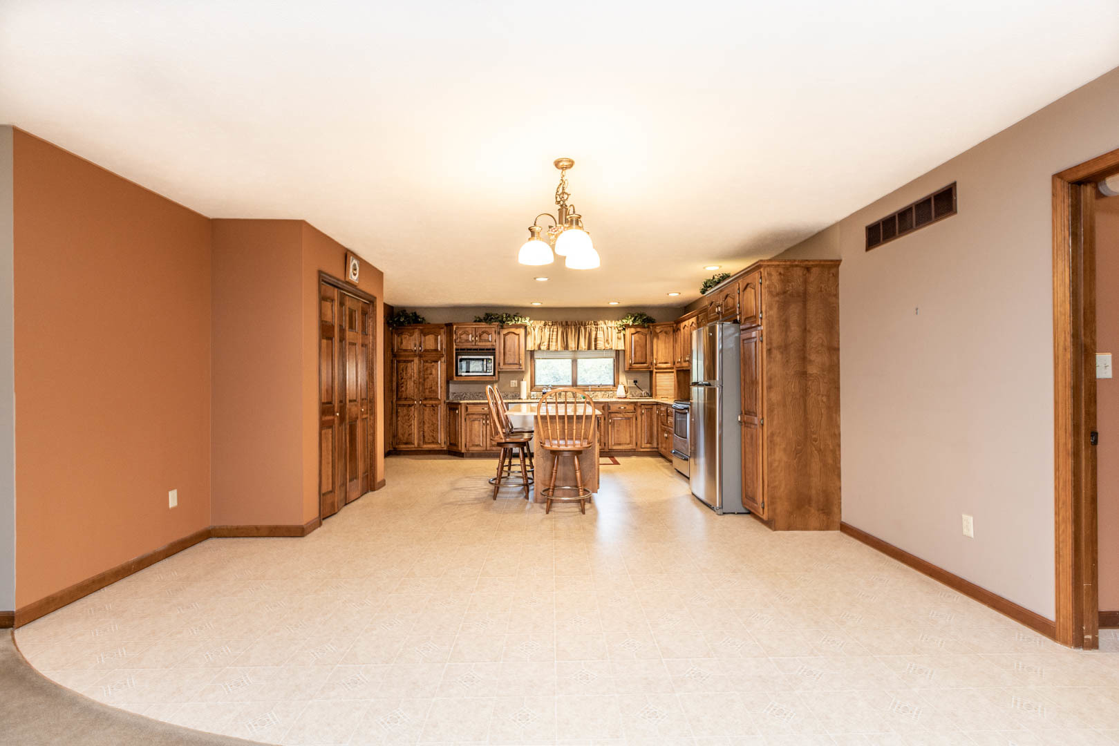19051 Meander Way Bloomington, IL 61705 - Photo 7 of 30 a view of a livingroom with furniture and a window
