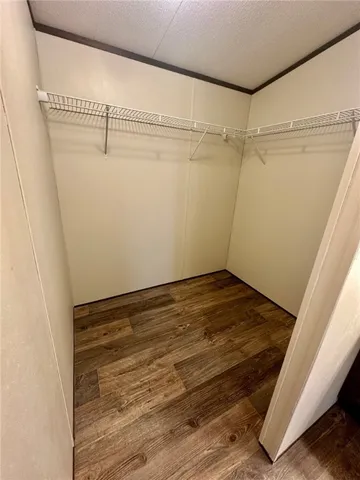 a view of a room with racks on the wall