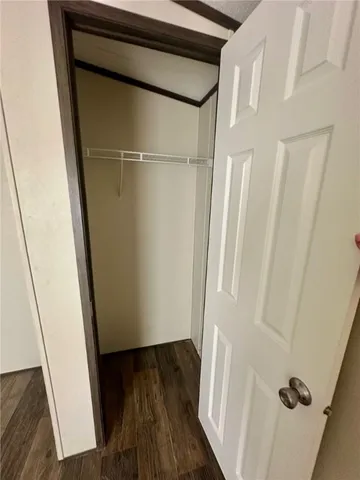 a view of front door with wooden floor