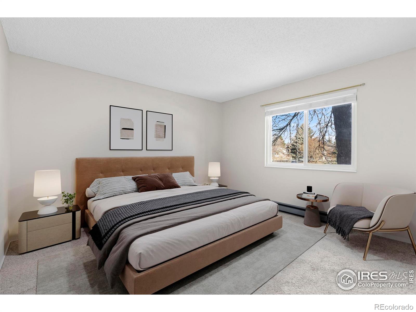 925 Columbia Road Fort Collins, CO 80525 - Photo 11 of 24 a bedroom with a bed lamp and a window