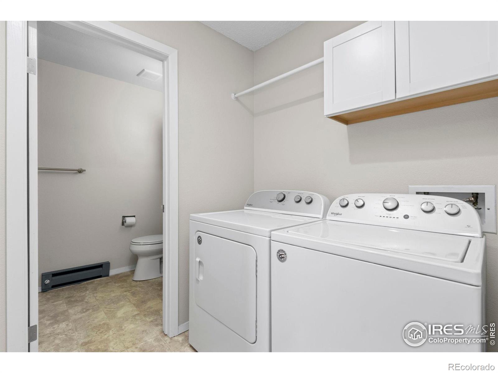 925 Columbia Road Fort Collins, CO 80525 - Photo 17 of 24 a utility room with dryer and washer