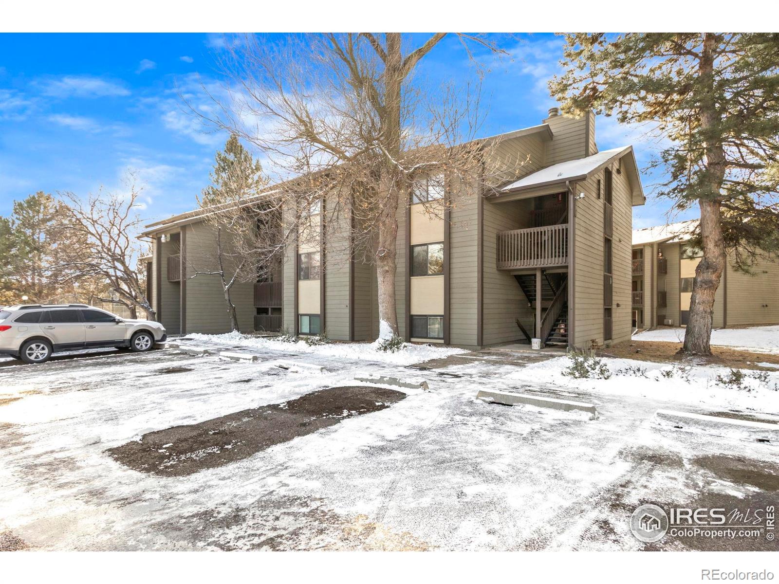 925 Columbia Road Fort Collins, CO 80525 - Photo 20 of 24 a view of a house with a snow on the road