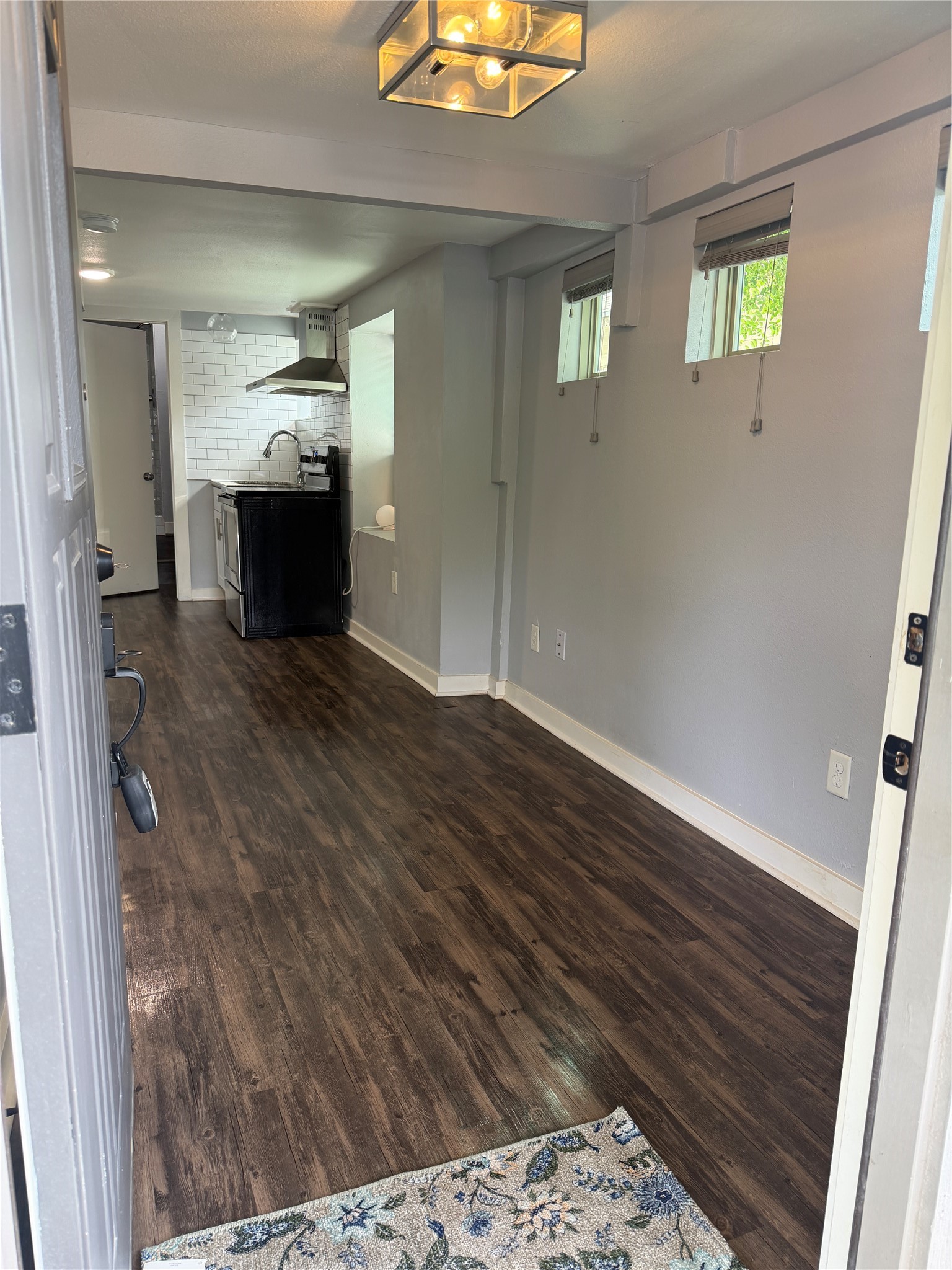 4630 Woodside Street, Unit 2 Houston, TX 77023 - Photo 2 of 11 a view of empty room with wooden floor