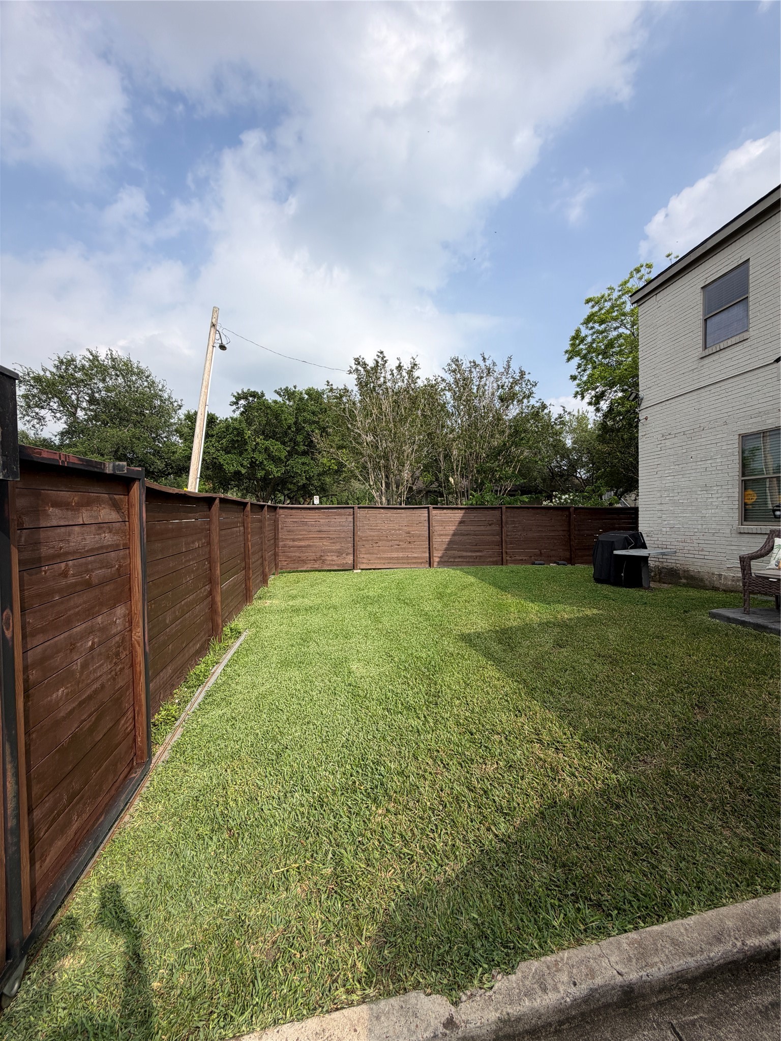 4630 Woodside Street, Unit 2 Houston, TX 77023 - Photo 10 of 11 a view of a backyard