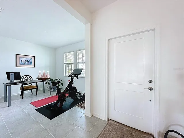 a kitchen with sink a stove and cabinets