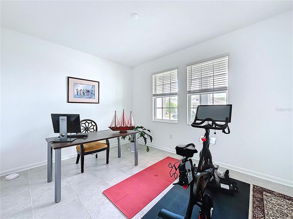 4190 Bull Street St. Cloud, FL 34772 - Photo 12 of 98 a room with furniture and a window