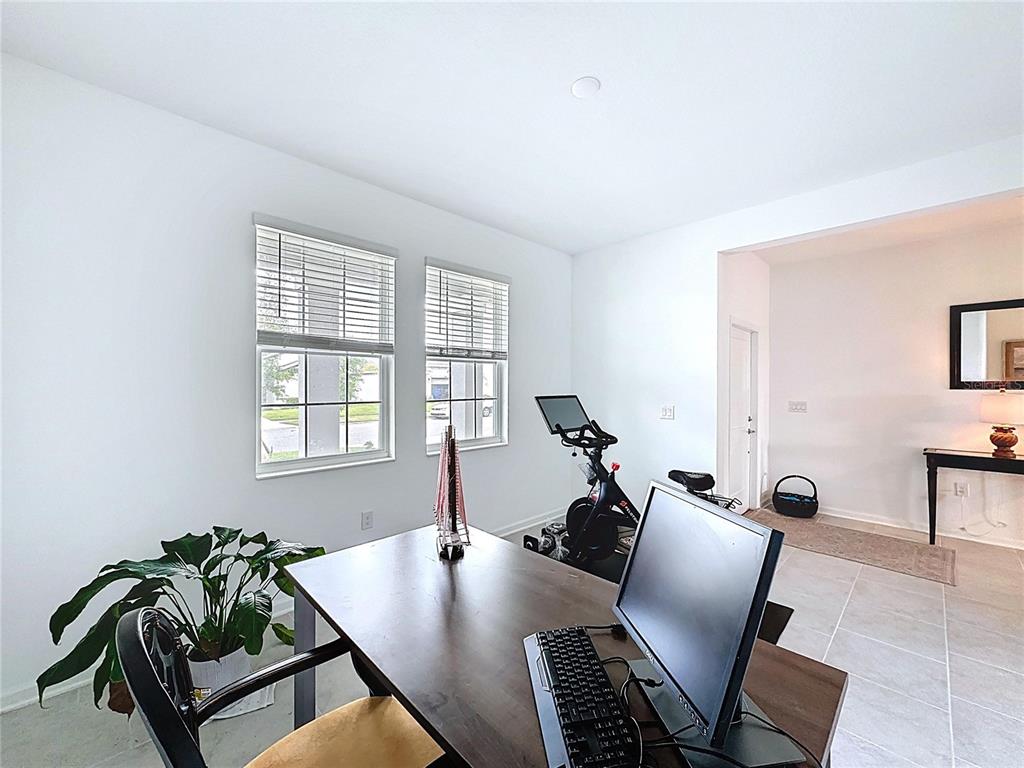 4190 Bull Street St. Cloud, FL 34772 - Photo 14 of 98 a view of a dining room with furniture and window