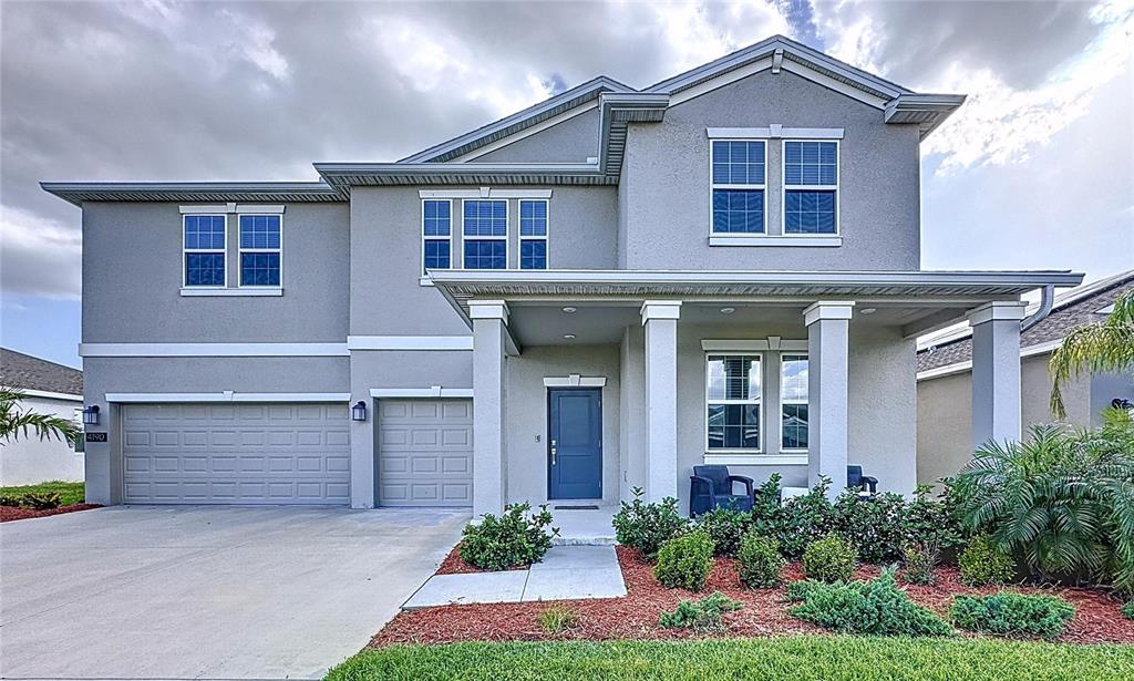4190 Bull Street St. Cloud, FL 34772 - Photo 2 of 98 front view of a house with a yard