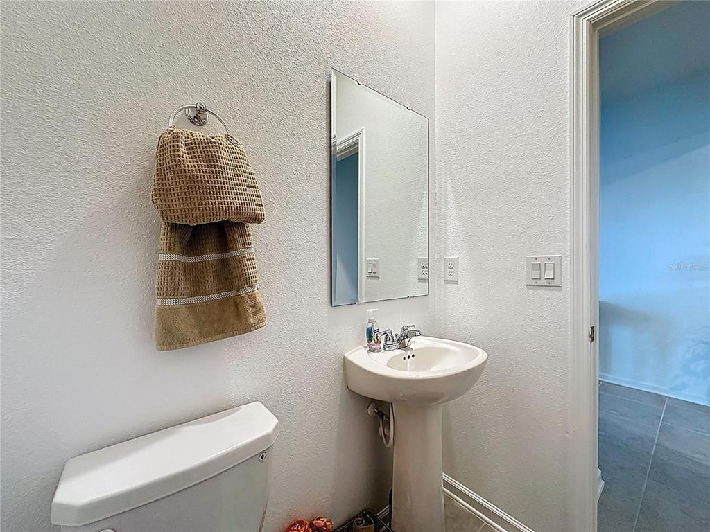 4190 Bull Street St. Cloud, FL 34772 - Photo 29 of 98 a bathroom with a sink toilet