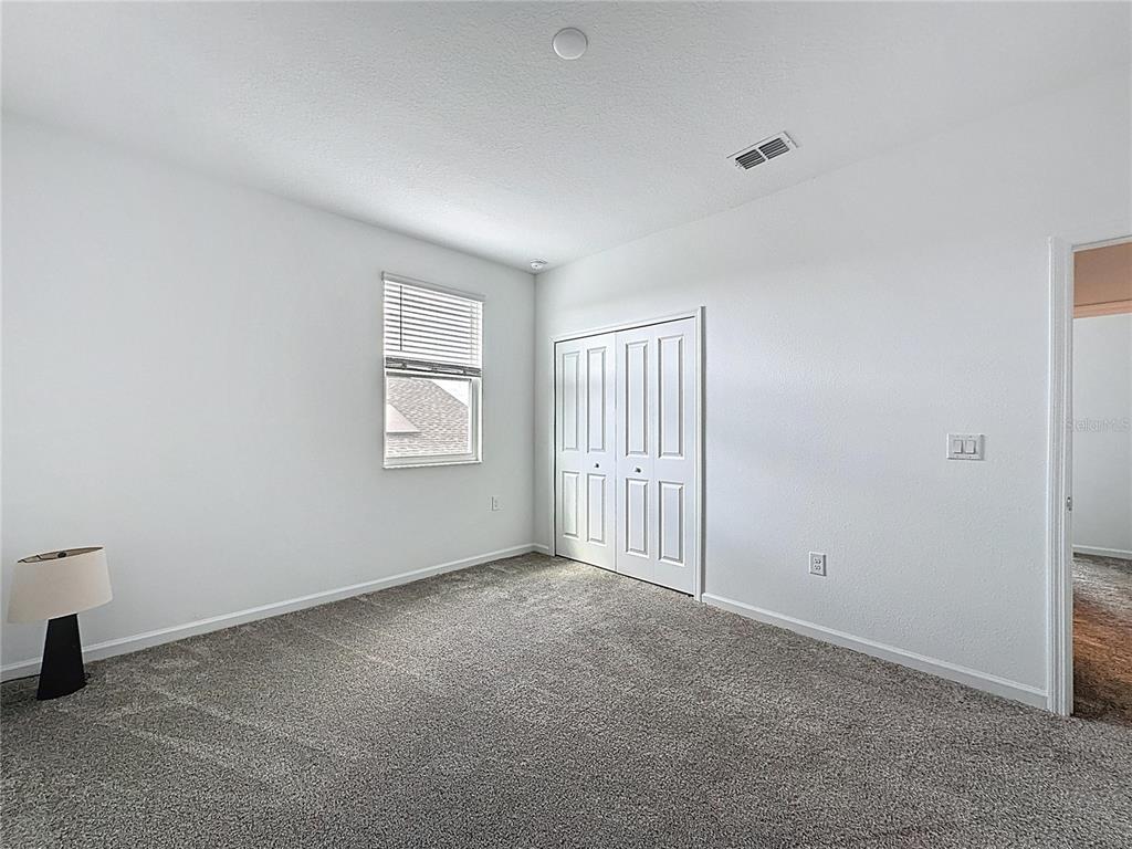 4190 Bull Street St. Cloud, FL 34772 - Photo 69 of 98 a view of an empty room with a window