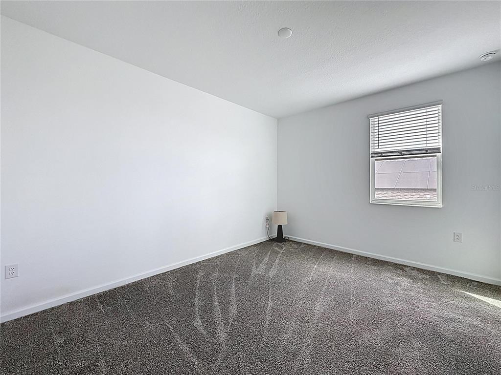 4190 Bull Street St. Cloud, FL 34772 - Photo 71 of 98 an empty room with windows