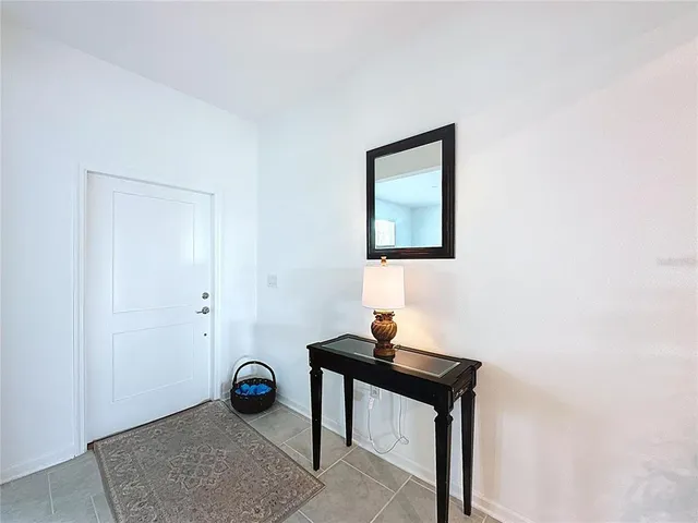 a view of a workspace with furniture