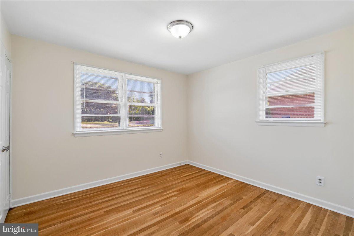 13012 Georgia Avenue Silver Spring, MD 20906 - Photo 19 of 31 Bright and airy room with hardwood floors.