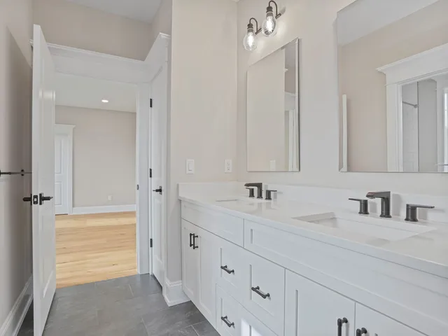 a bathroom with a toilet and a bathtub