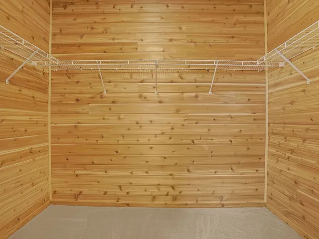 a view of a balcony with wooden floor