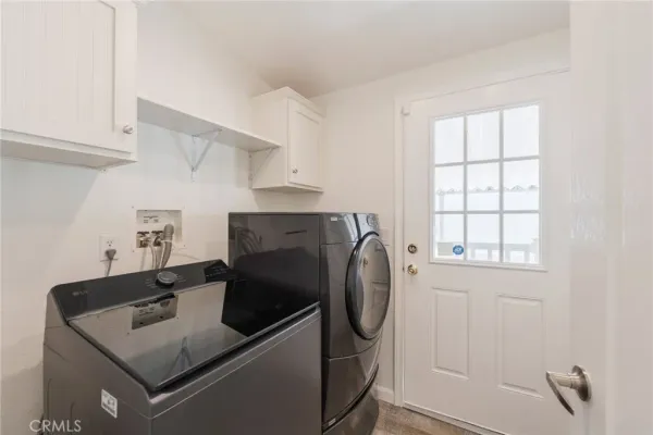 a kitchen with a stove and a sink