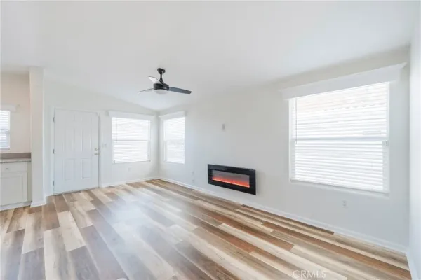 a view of empty room with windows