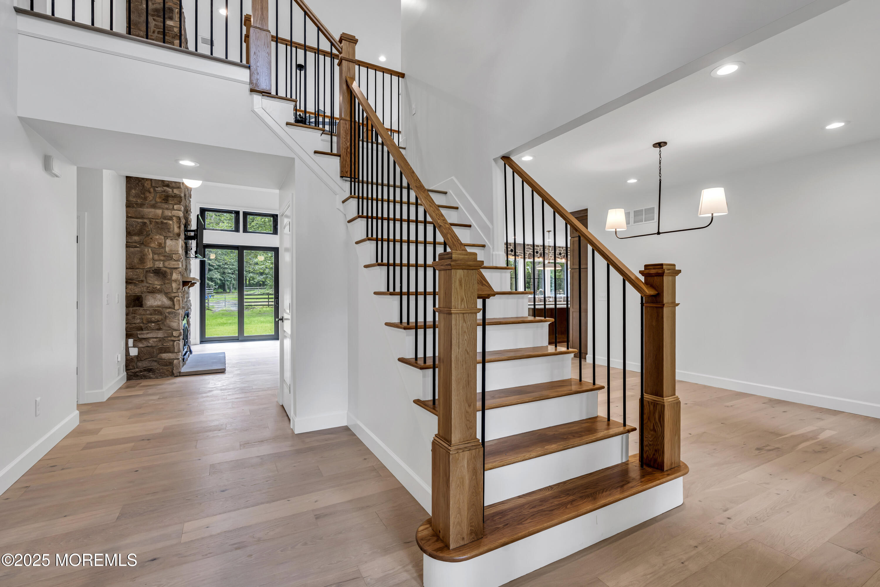 379 Buckalew Road Freehold, NJ 07728 - Photo 13 of 83 a view of entryway and hall with wooden floor