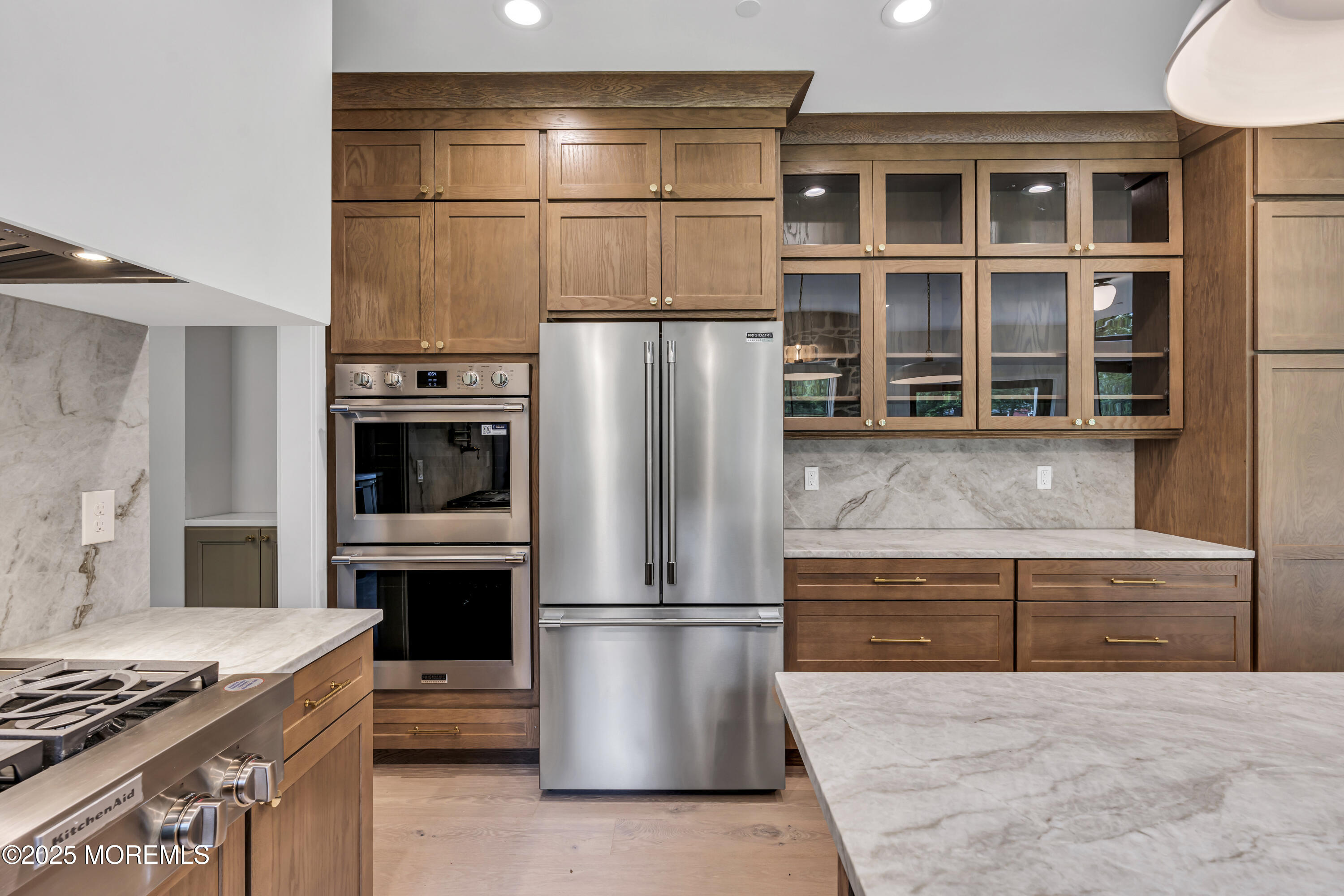 379 Buckalew Road Freehold, NJ 07728 - Photo 35 of 83 a kitchen with stainless steel appliances granite countertop a refrigerator and a stove