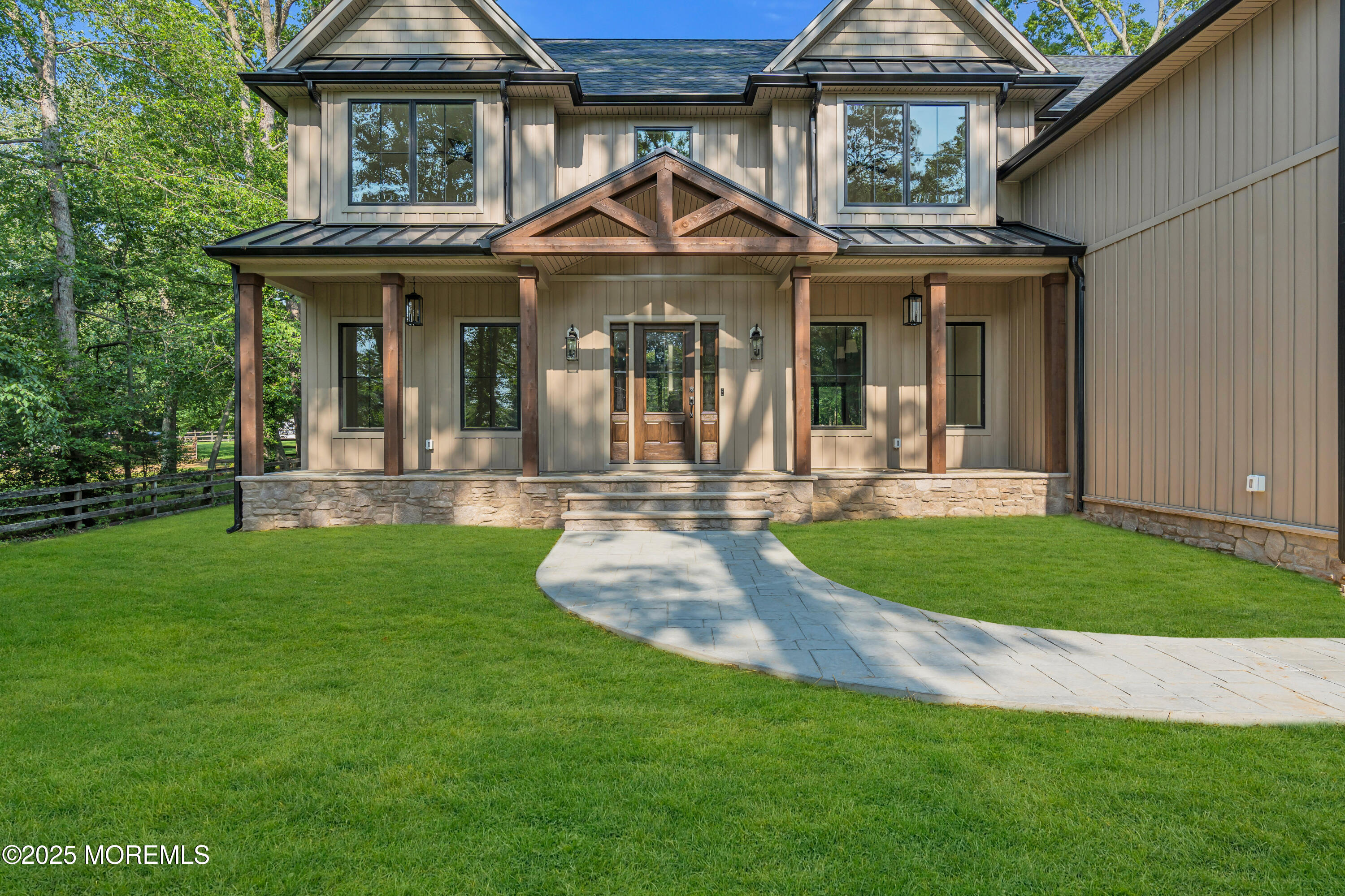 379 Buckalew Road Freehold, NJ 07728 - Photo 7 of 83 a front view of a house with a yard table and chairs