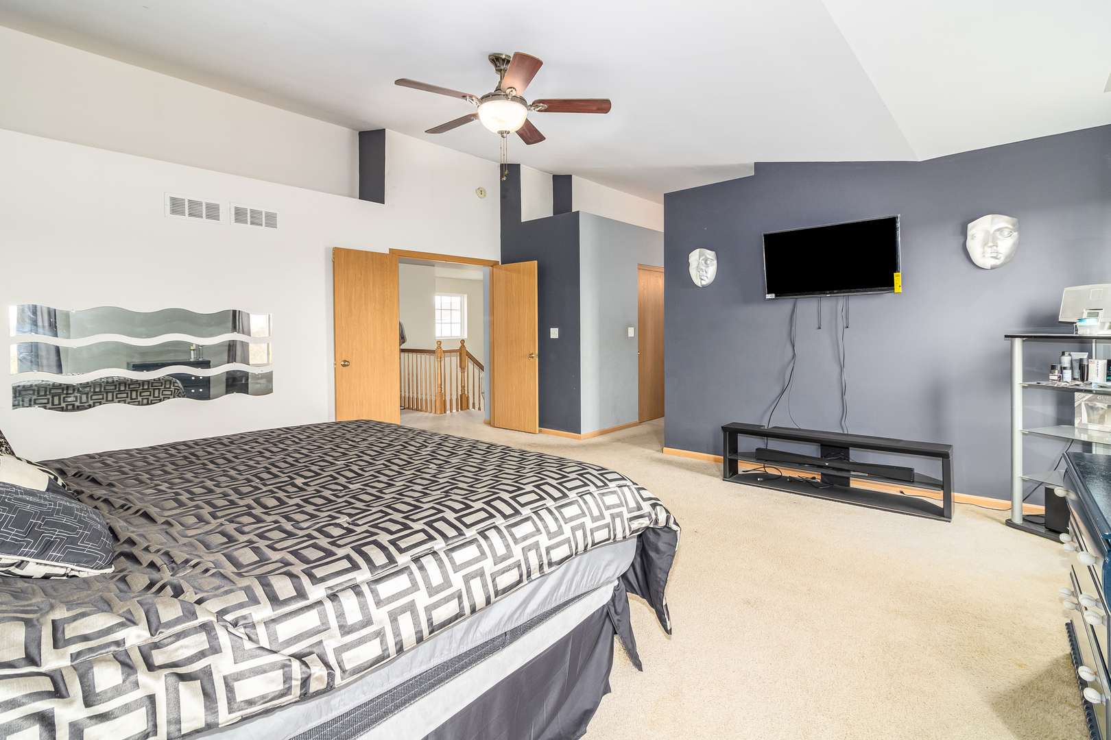 25801 South Red Oak Road Channahon, IL 60410 - Photo 16 of 24 a bedroom with a bed a flat screen tv and dresser