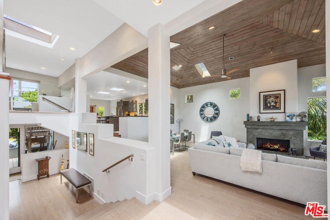1312 Shoreline Drive Santa Barbara, CA 93109 - Photo 13 of 67 a living room with furniture and a fireplace