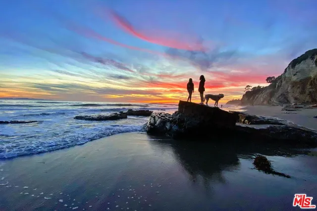 a view of kitchen living room with a large window
