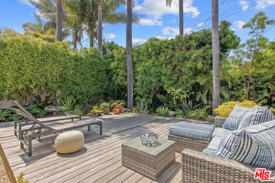 1312 Shoreline Drive Santa Barbara, CA 93109 - Photo 38 of 67 a view of patio with couches table and chairs and potted plants